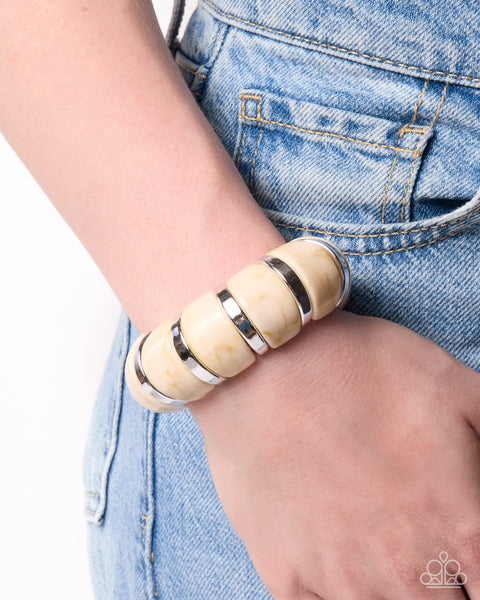 COMING SOON Paparazzi 
Transparent Tenacity - White Bracelet