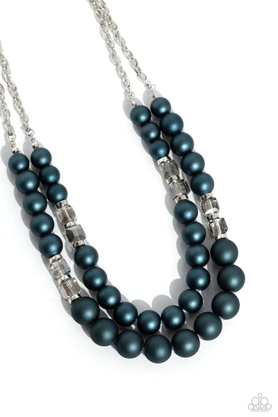 Paparazzi Shopaholic Season Necklace and Shopaholic Showdown Blue Bracelet

P9RE-BLXX-245QB
Two strands of oversized blue beads featuring a subtle shimmer, silver accents, and clear gray cubed beads stretch around the wrist, creating refined,