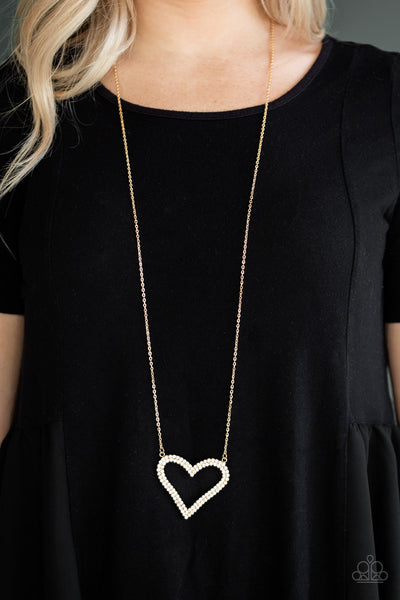 Paparazzi Pull Some HEART-strings - Gold Necklace