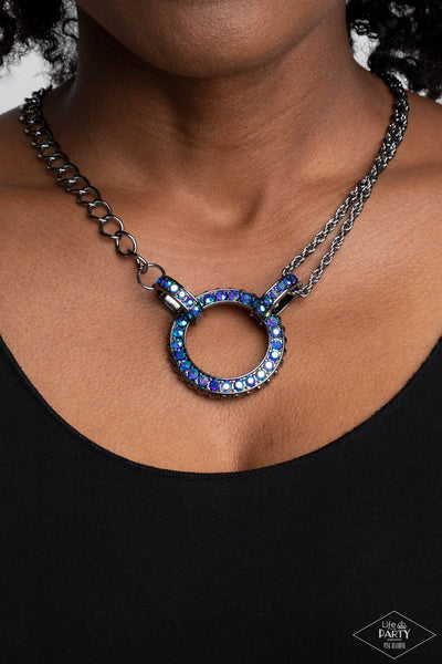 Paparazzi 
Am I GLEAMing? Multi Iridescent Ring and Razzle Dazzle UV Blue Necklace Set